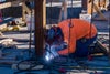 A worker is welding