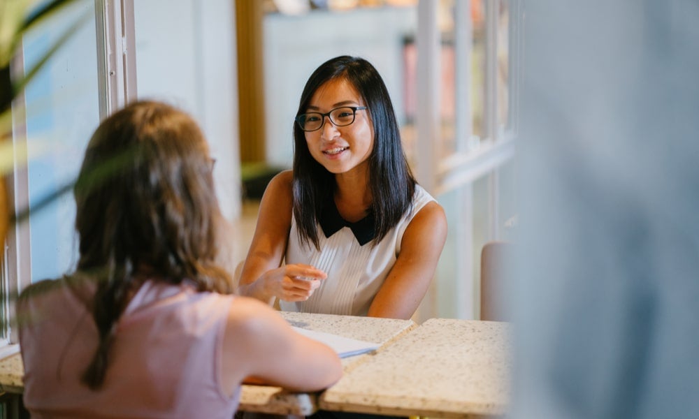 Job candidates will likely ask employers about working arrangements and opportunities for remote and hybrid working options.jpg