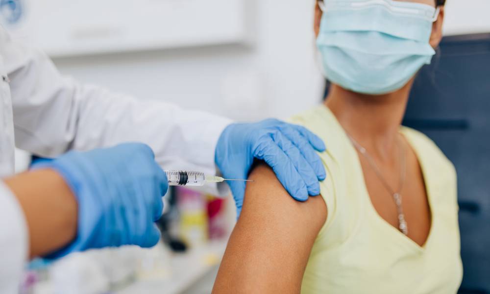 A woman being vaccinated (1).jpg