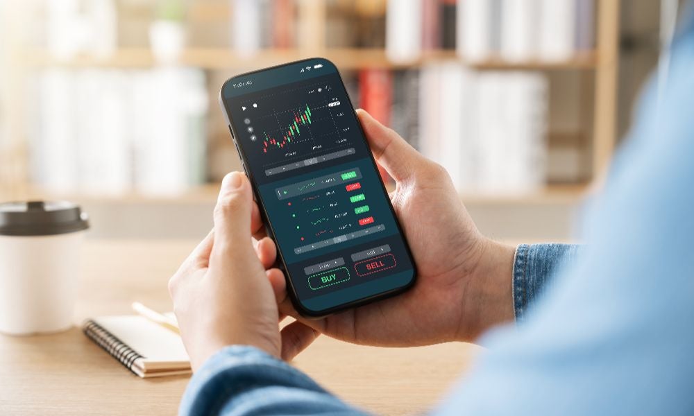 Mobile investment apps transformed trading to an activity made possible away from desktop computers.jpeg