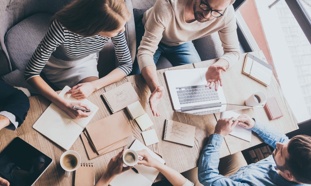 Colleagues working on a strategy-min.jpg