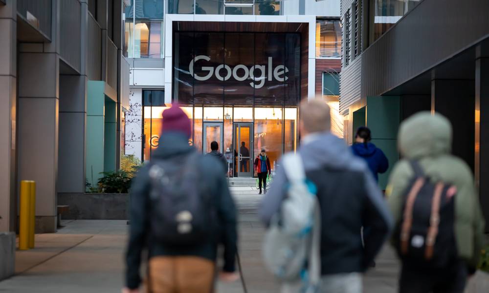 Passersby look at Google office building (1).jpg