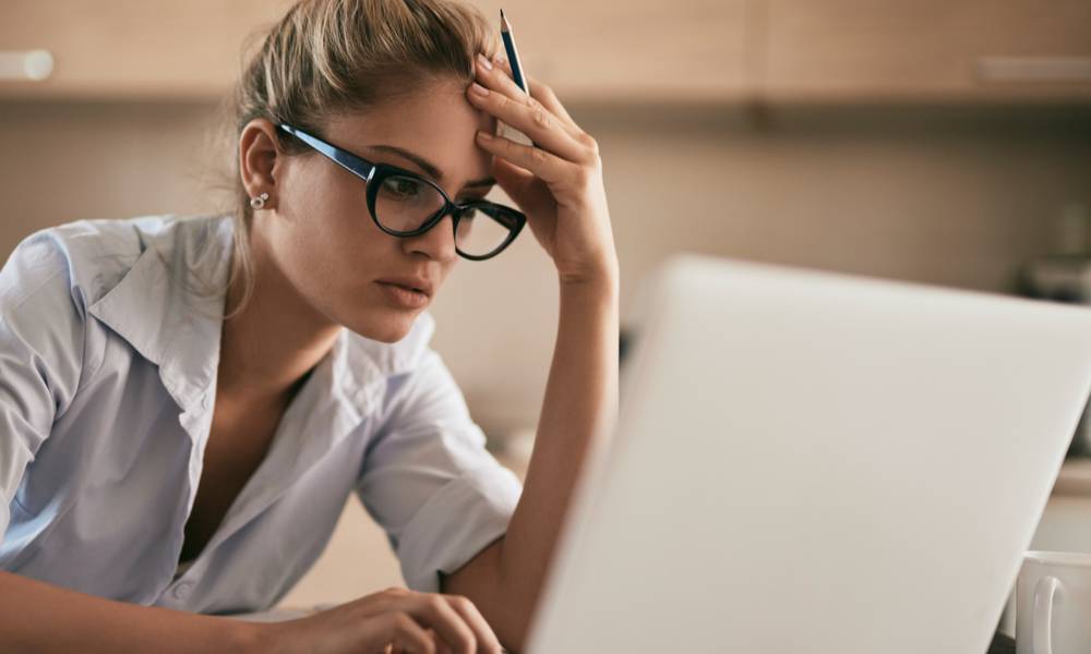 Businesswoman struggles to understand tax relief debt rules.jpeg