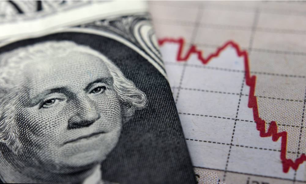 Stock market graph next to US one-dollar bill red line indicates a recession period.jpeg