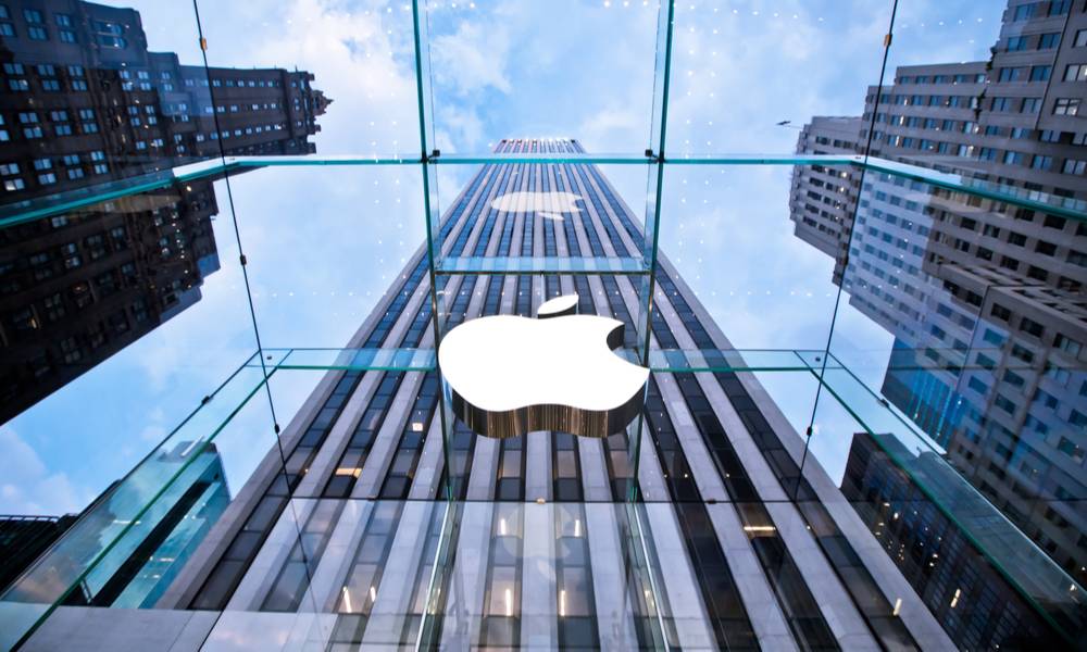 Apple sign on building towering over the street (1).jpg