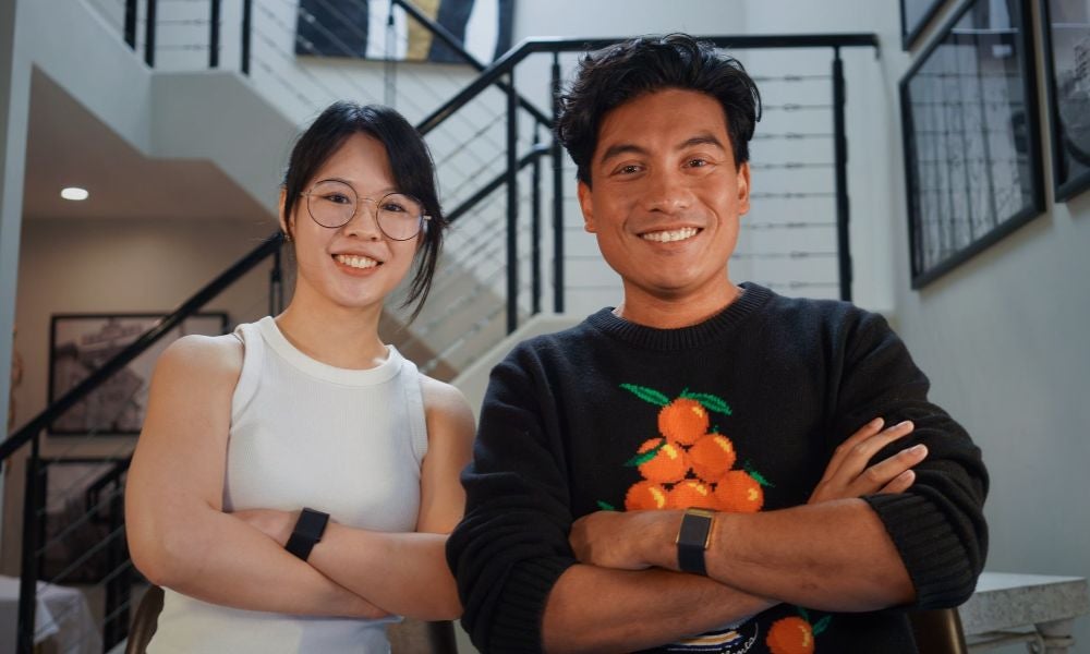 Pasha Rayan with A1Base Co-founder and CTO Pennie Li.JPG