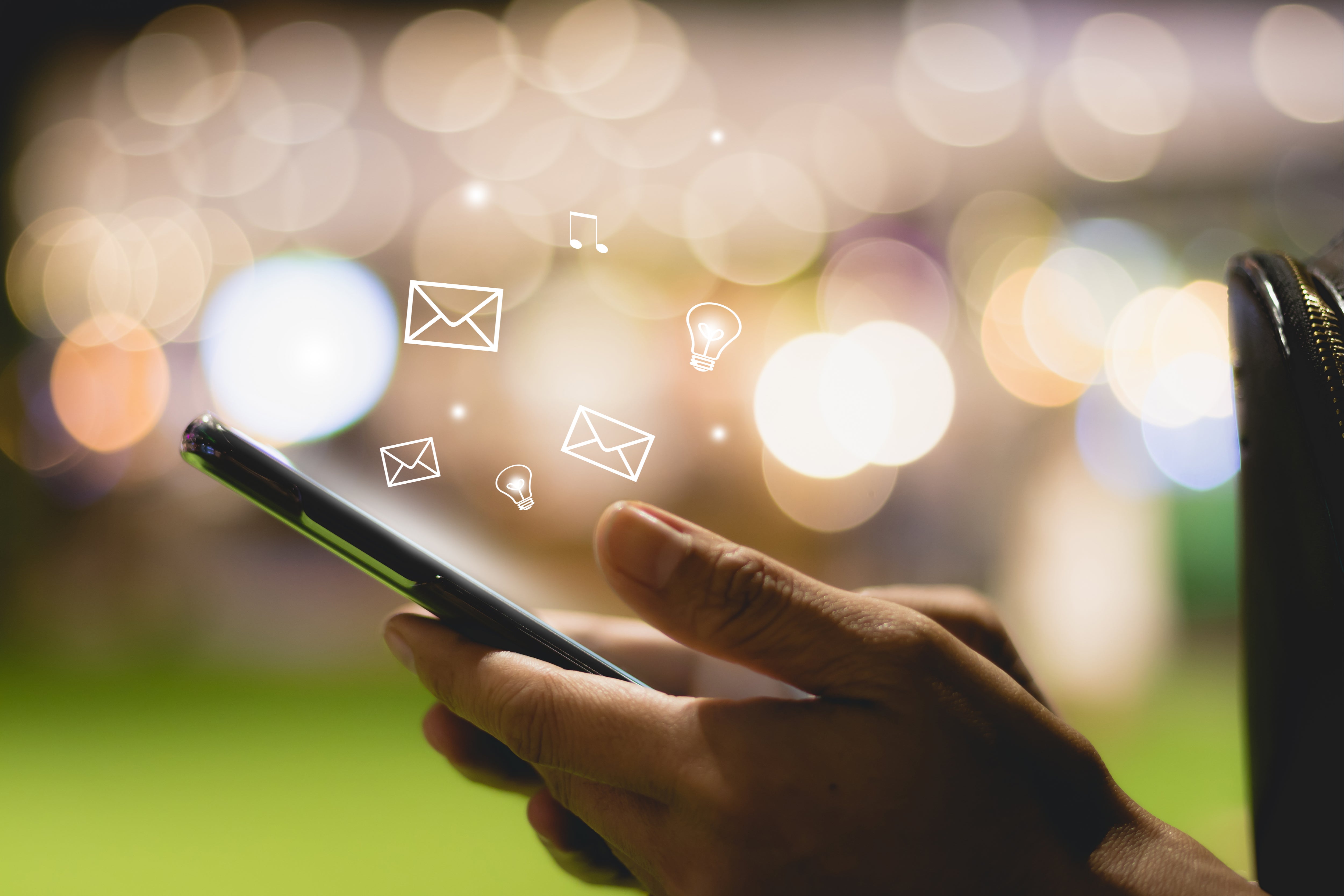 Person receives emails on phone communication uncertainty trust leaders.jpeg