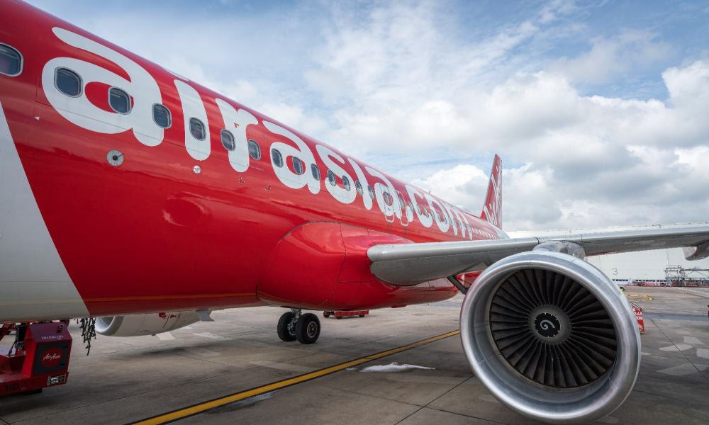 Air Asia founder Tony Fernandez decided not to diversify beyond the airline's business based on his observation that competitors found limited success in similar forays.jpeg