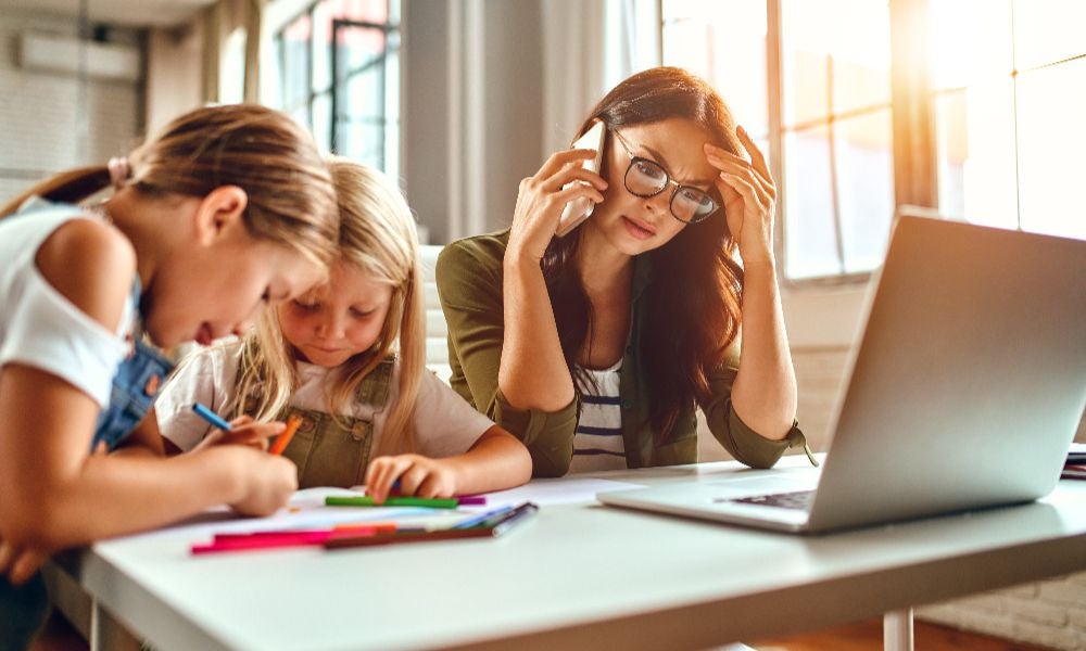 Women bear a disproportionate share of the costs associated with hybrid work.jpeg