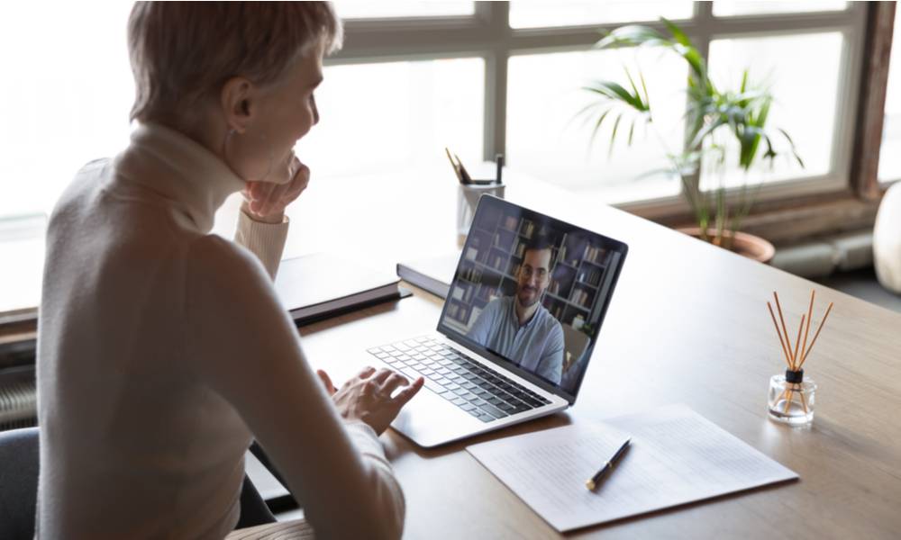 Woman conducts virtual interview.jpeg