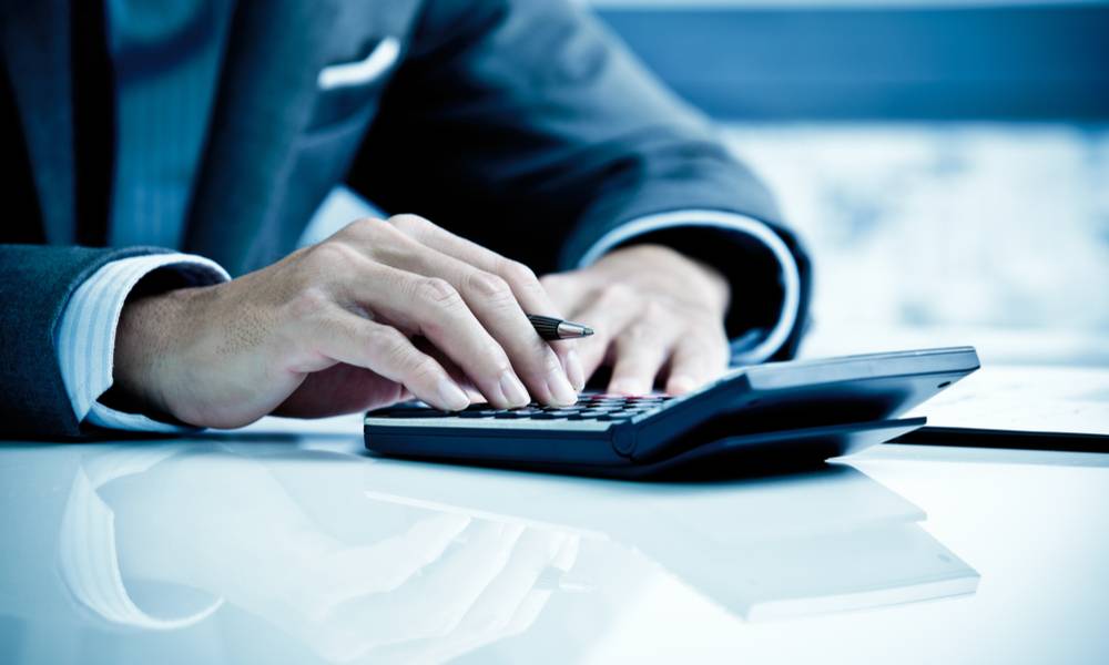 Businessman using calculator for accounting (1).jpg