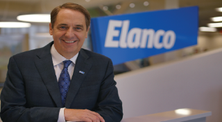 Jeff Simmons in front of the Elanco logo