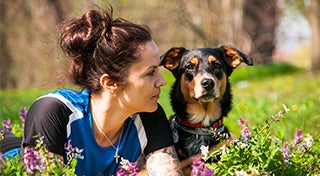 woman looking at a dog