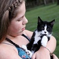 little girl holding a cat