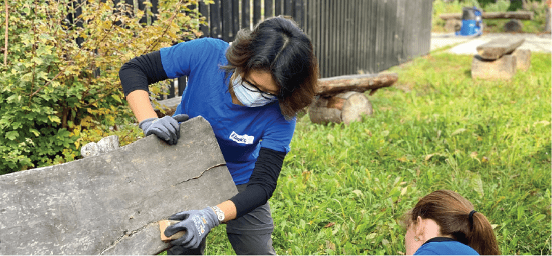 Elanco employees sanding down a surface on GDOP