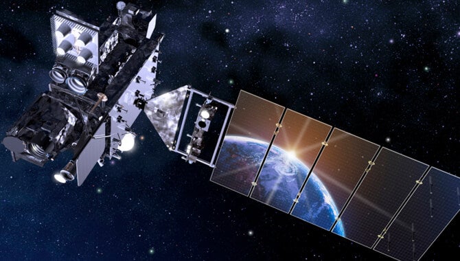 NOAA's GOES satellite in space, with the Earth and sun reflected in its panels