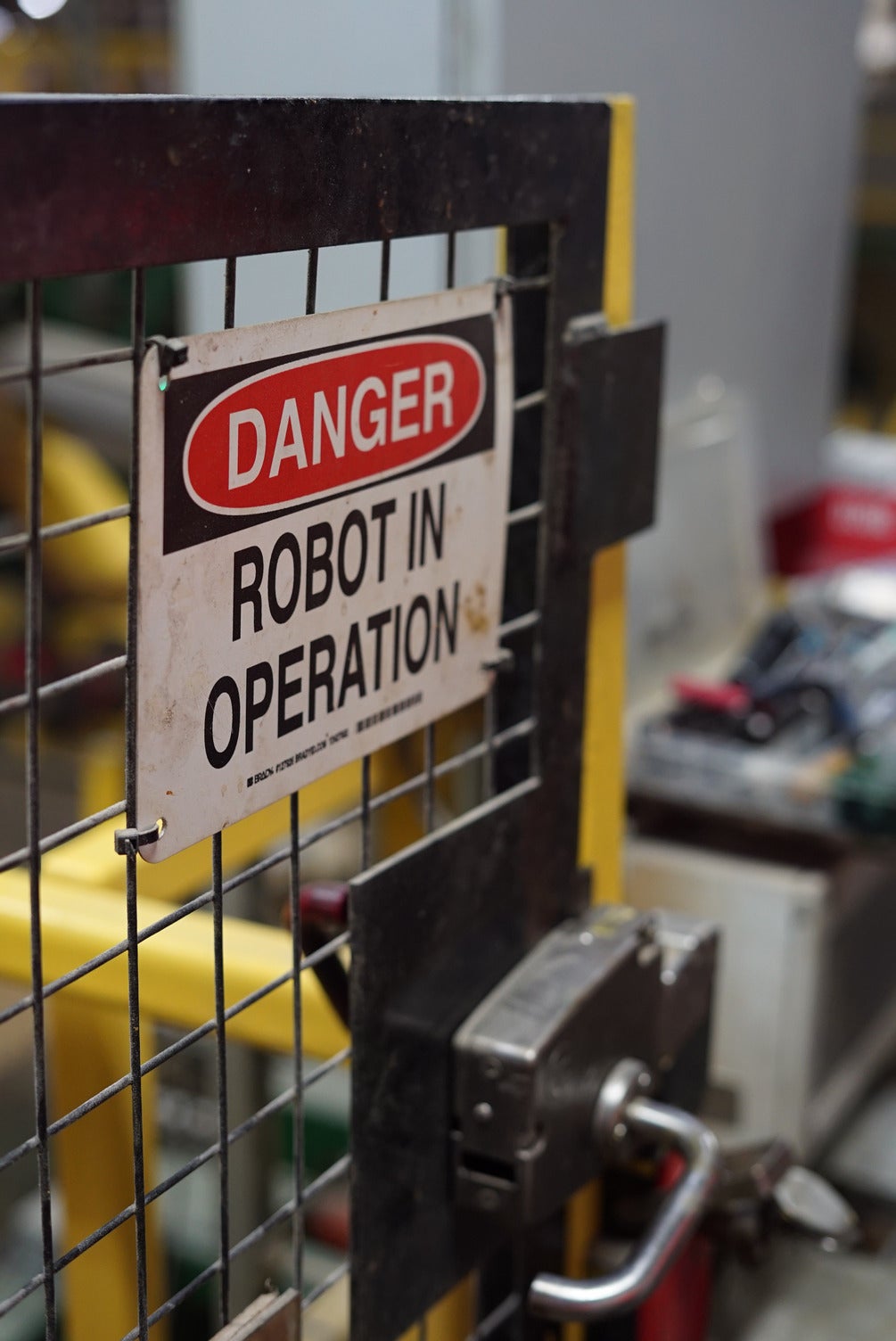Danger signage for robotic equipment in facility. 