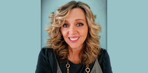 Kathy Saldana - white female smiling for camera