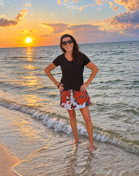 Tina standing in the water back pain free