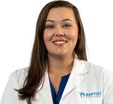 Katie Nelson is a female provider at Baptist Health Care. She had medium-length brown hair and a kind smile. She is shown in her white Baptist Medical Group jacket.