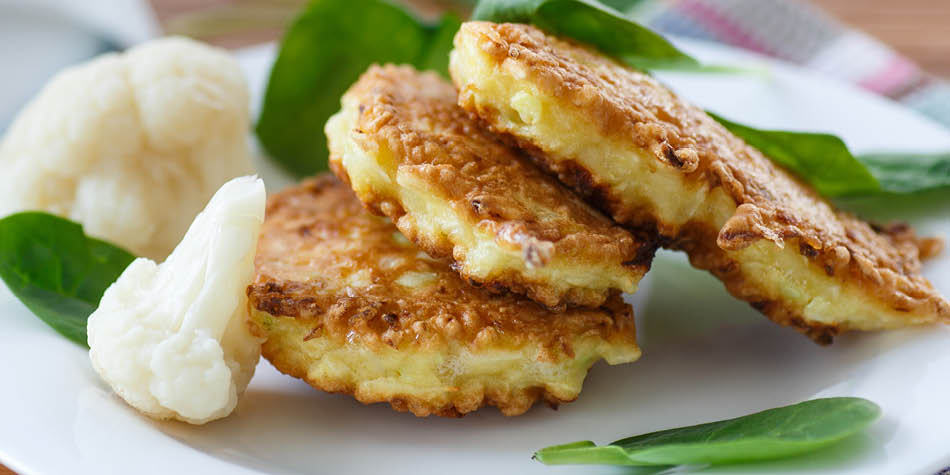 Cauliflower fritters served on a plate