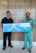 Dr. Carter and Dr. Payne holding TriClip