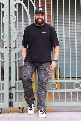 Dalton is pictured most recently in casual clothing, fit and muscular