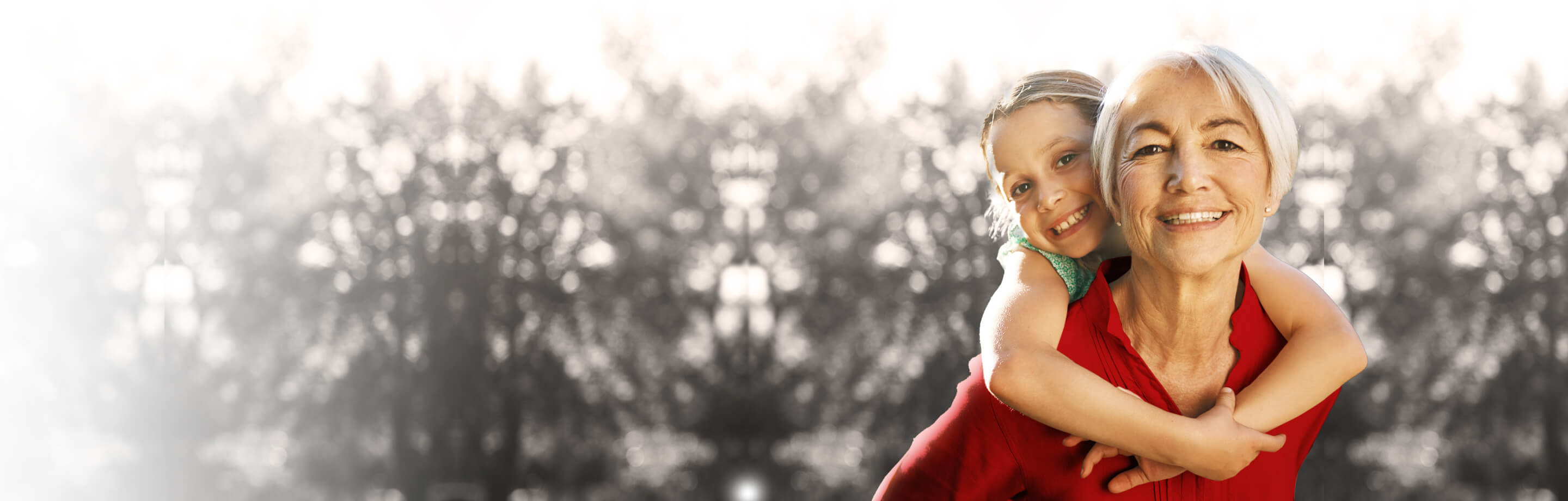 Woman carrying daughter