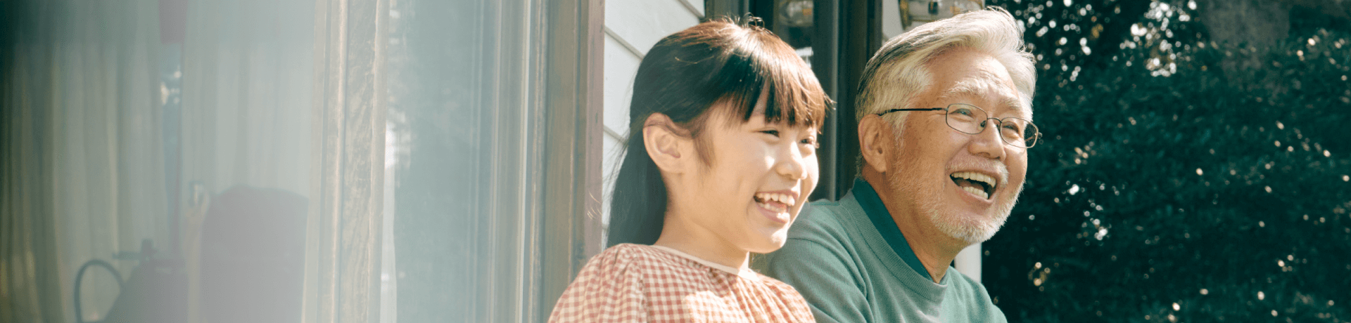father and daughter smiling