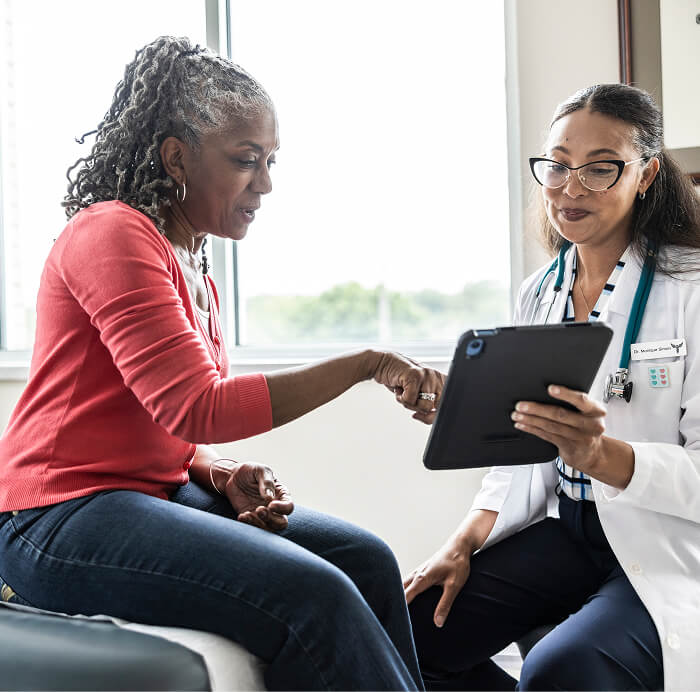 Patient consulting with doctor