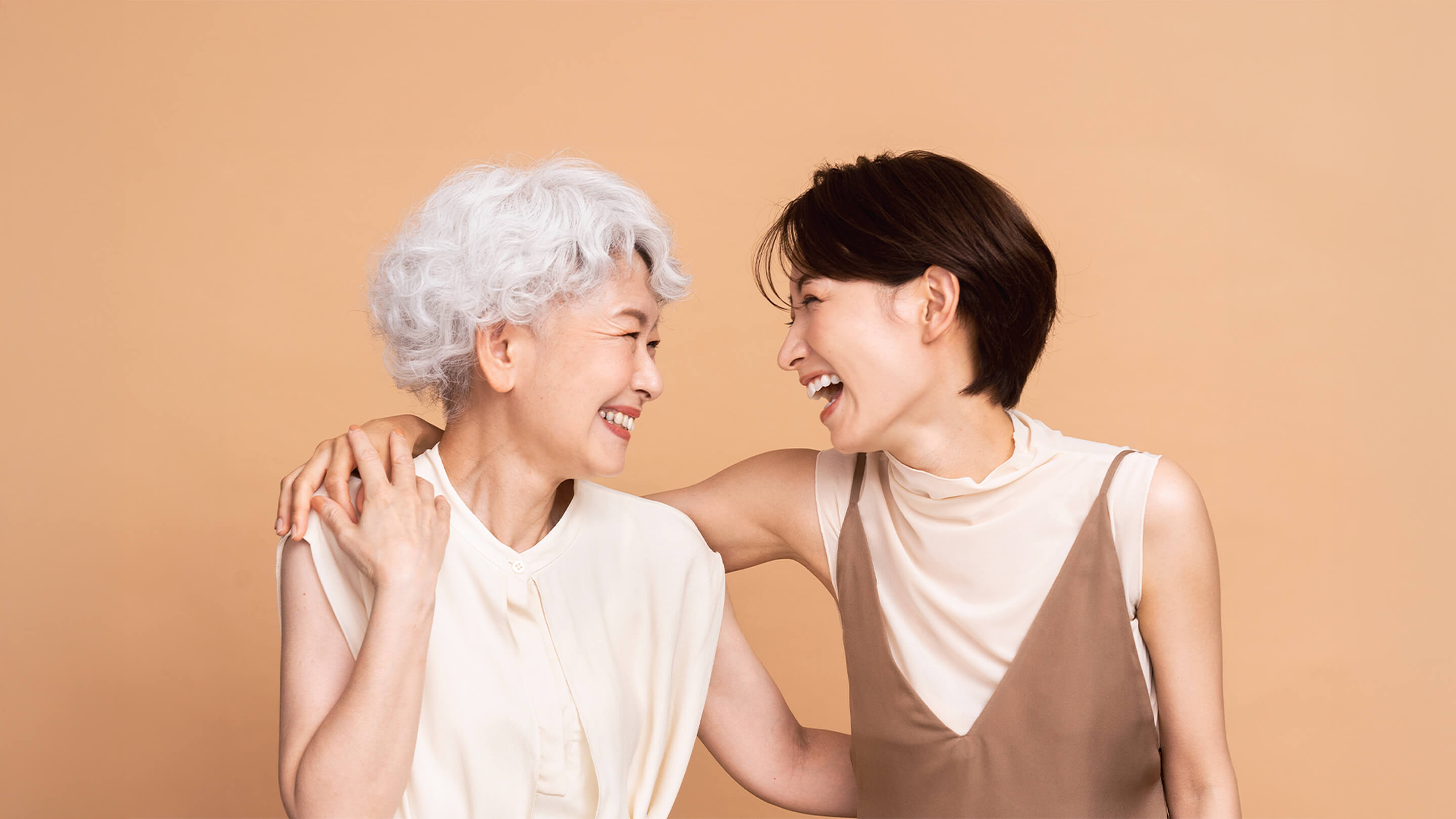 two women laughing