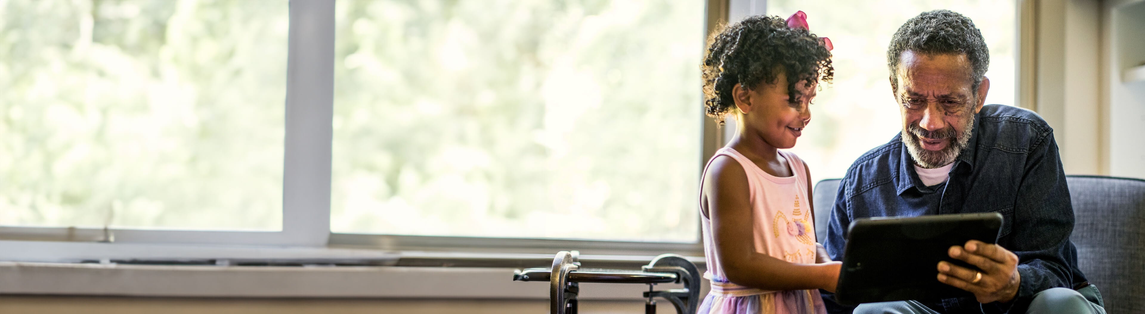 a man and a little girl smiling 