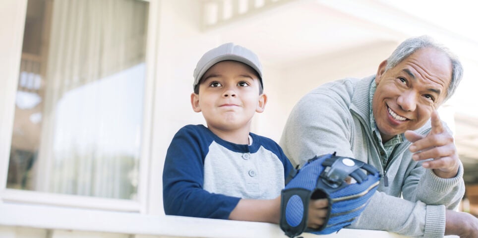 Grandfather Grandson holding Baseball mitt