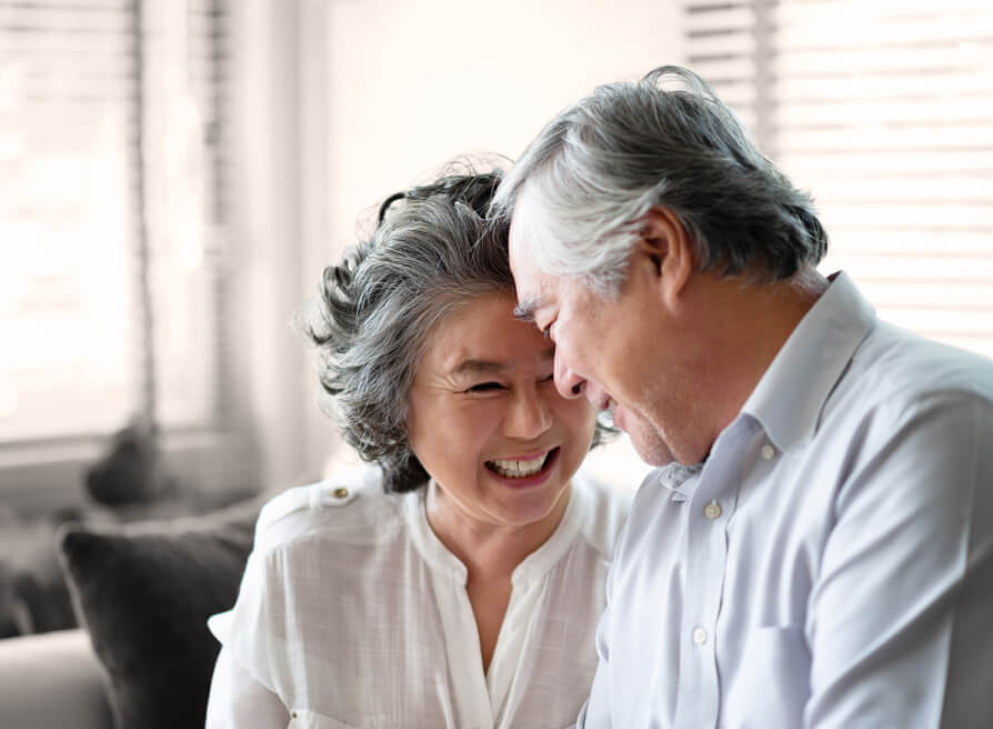 Woman smiling at man