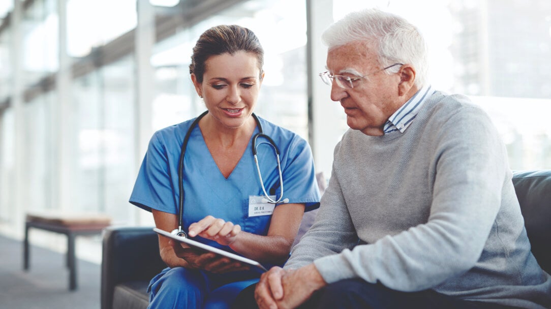 Doctor listening to patients heart