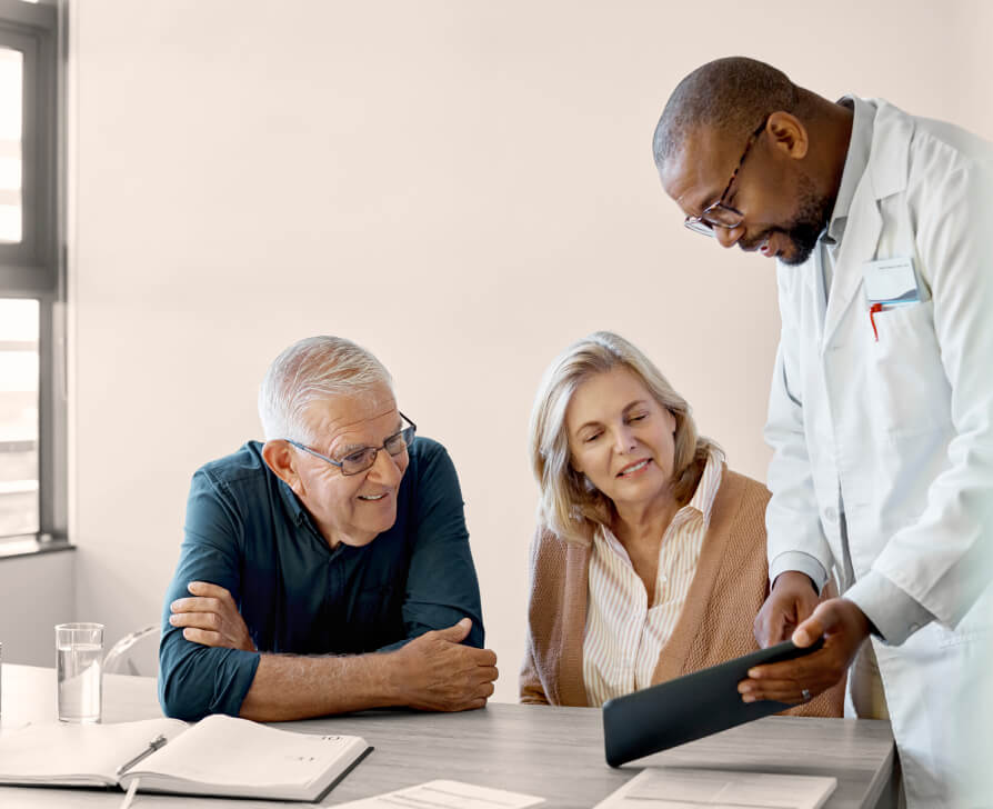 Doctor speaking to patients