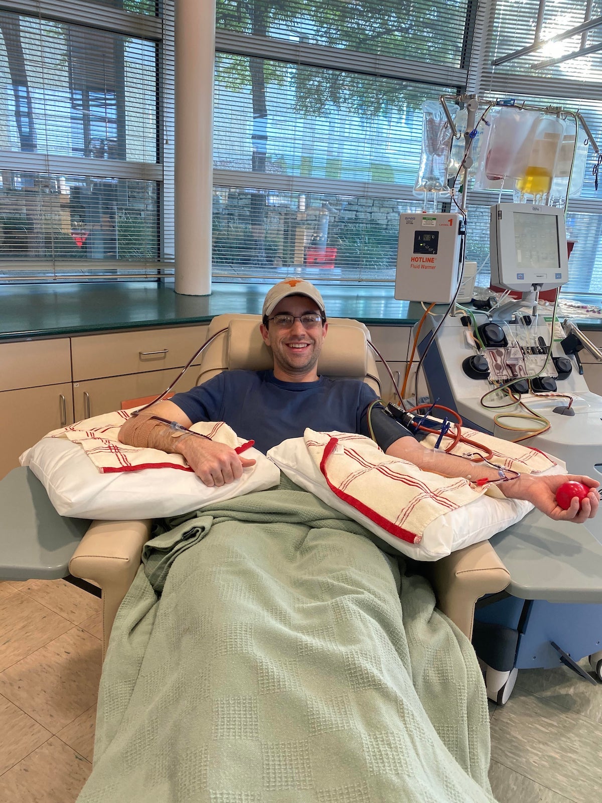 William is all smiles as he donates blood stem cells.
