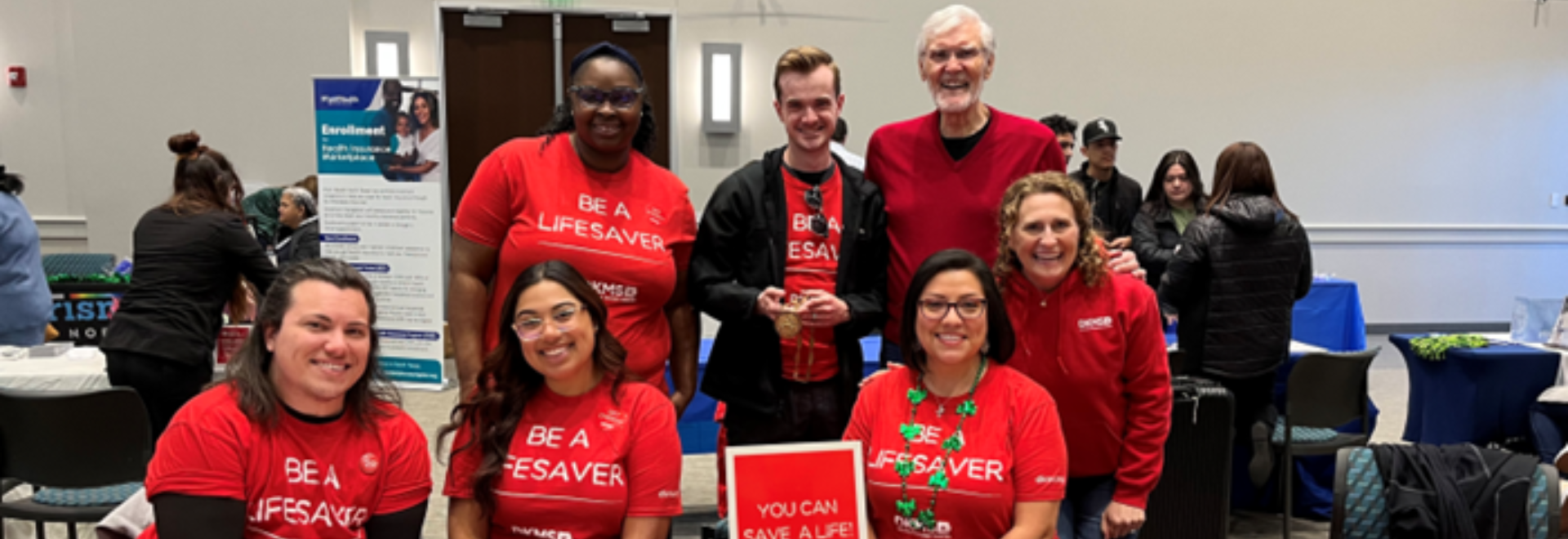 Earl Young's Team with DKMS staff and volunteers at a blood stem cell registration drive