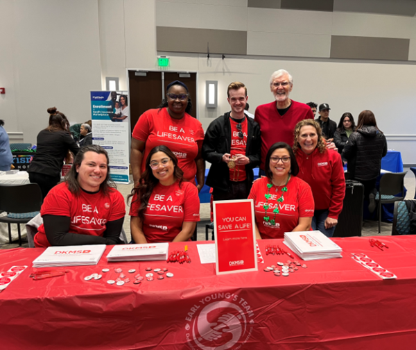Earl Young's Team and DKMS at a donor registration table