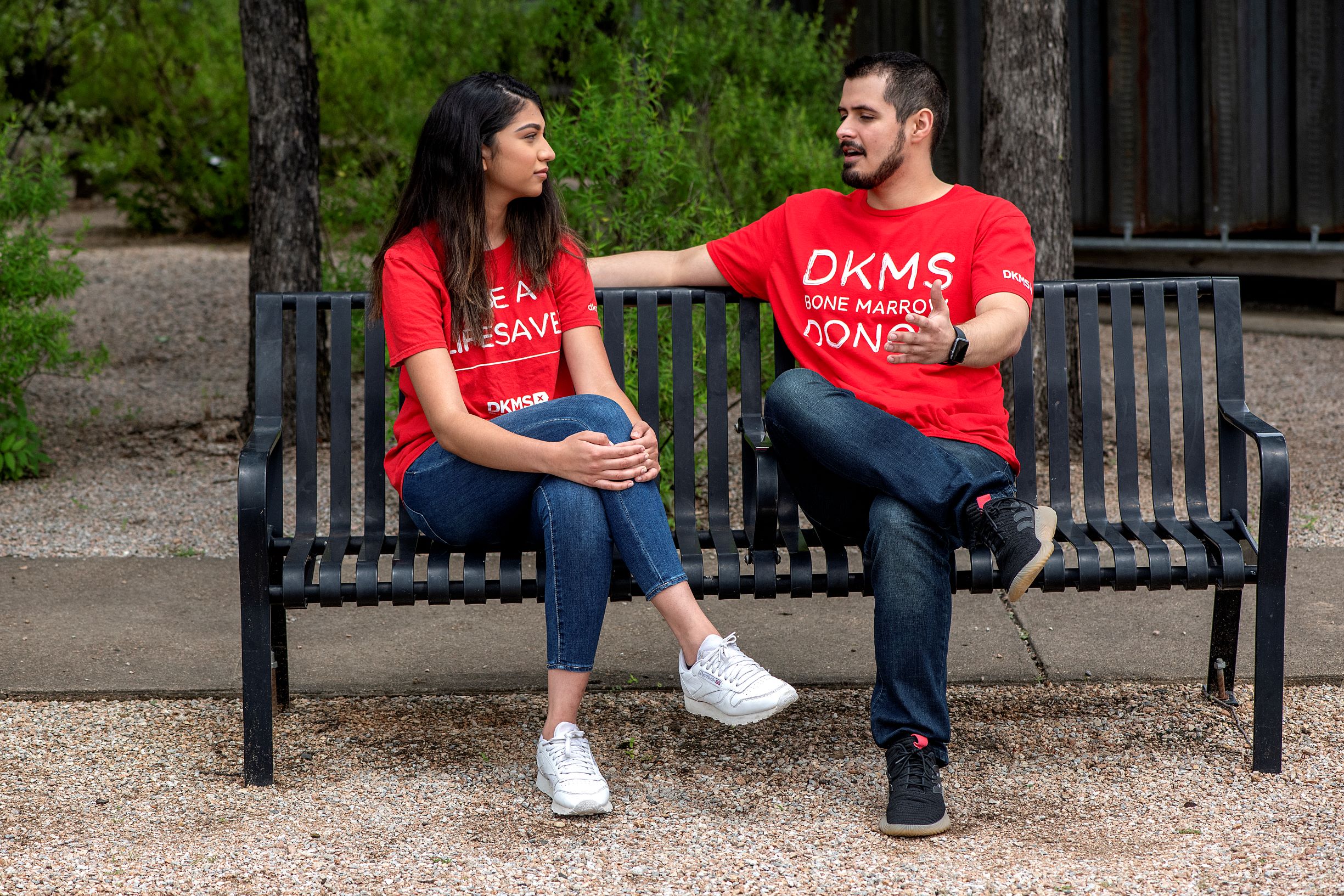 couple taking in a bench 