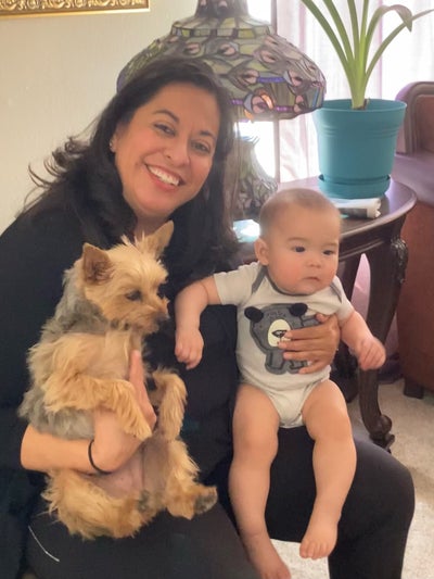 Isela with a child