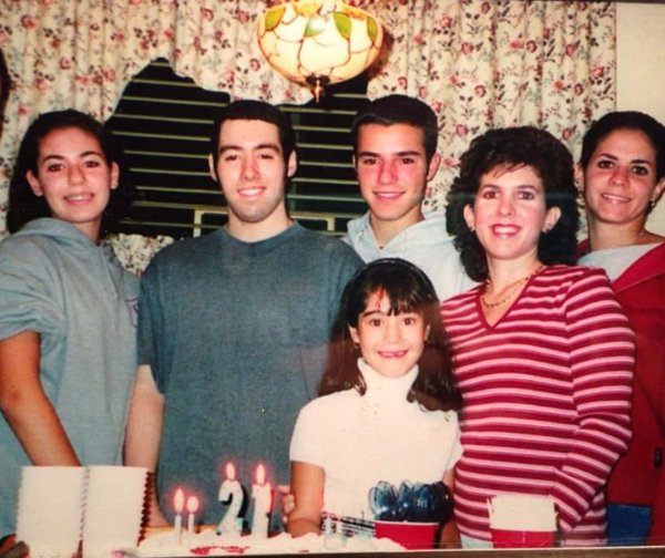 Michael and his family celebrating his 21st birthday