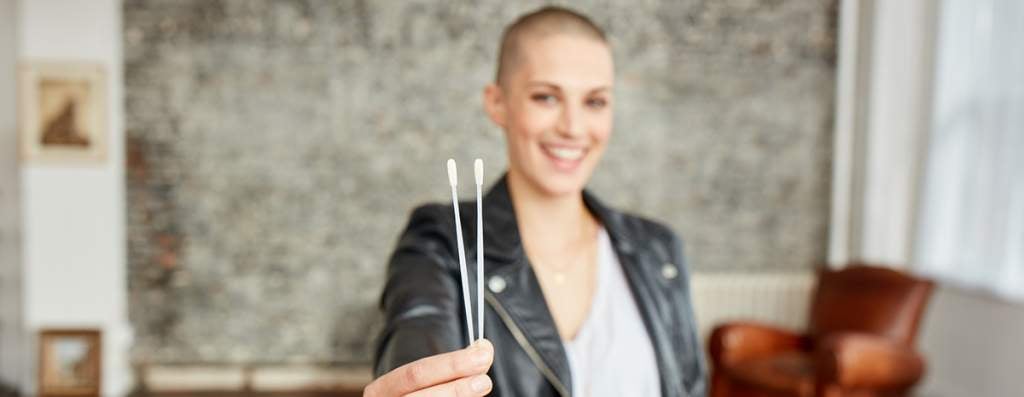 Dana donor holding 2 swabs