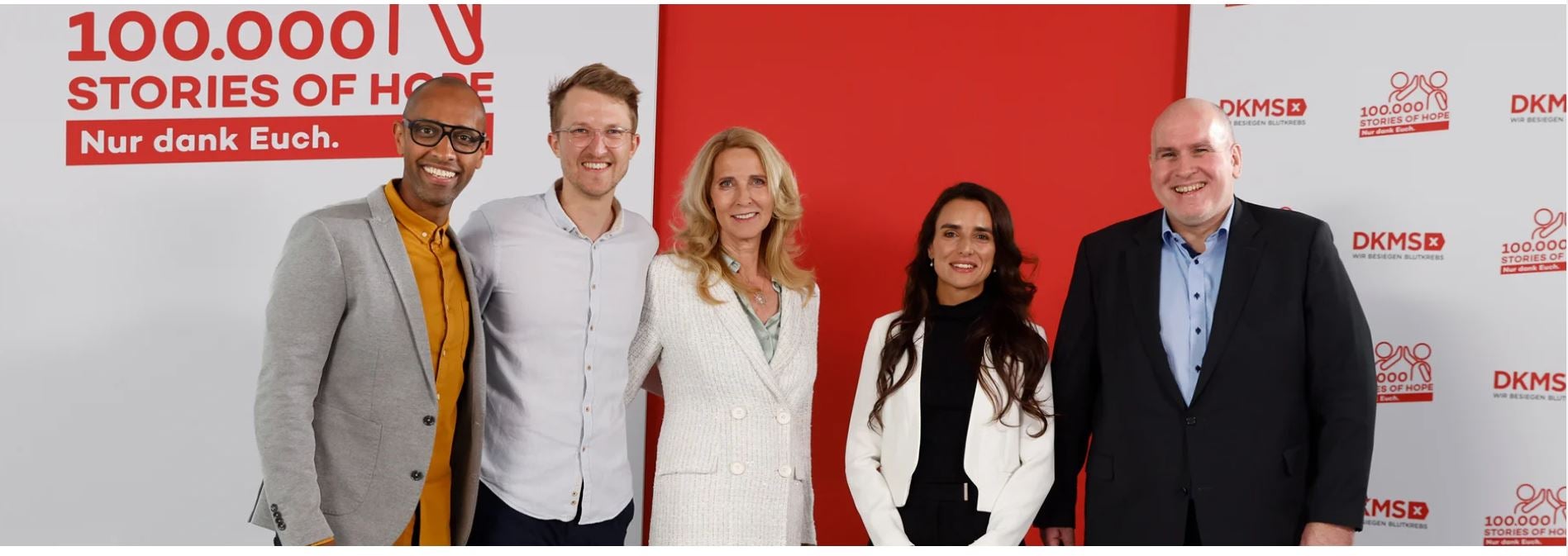 DKMS Global CEO, Dr. Elke Neujahr, celebrates 100,000 blood stem cell/bone marrow donations facilitated through DKMS, meaning 100,000 second chances at life. 