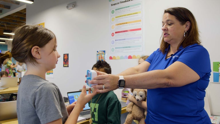 Christie working with the kids at Alpha.