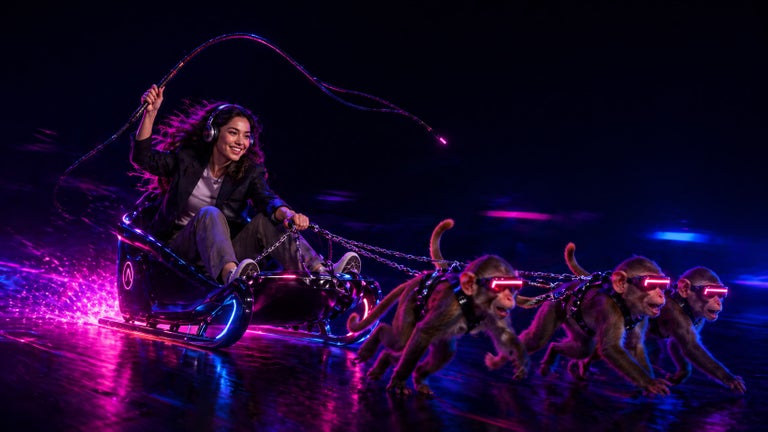 A remote worker drives a sled of monkeys. 