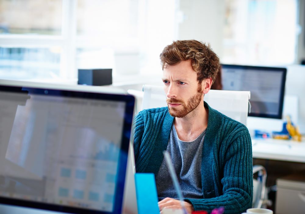 Businessman at workstation and start-up office