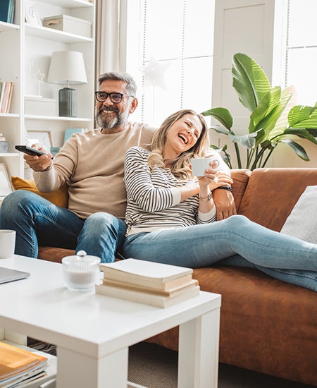 Couple lounging on the couch