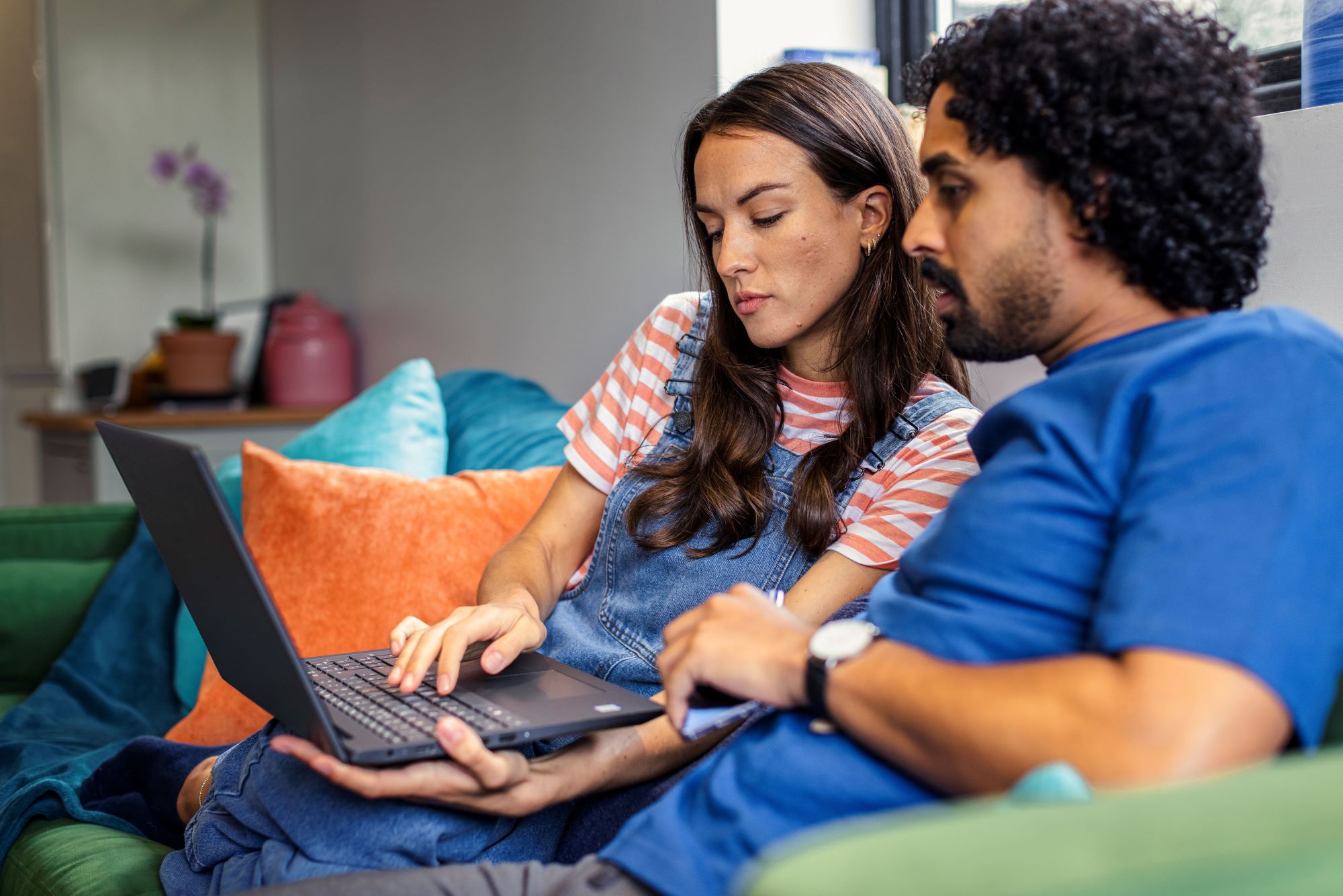 Young couple on laptop
