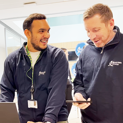 Two Bord Gáis Energy engineers laughing